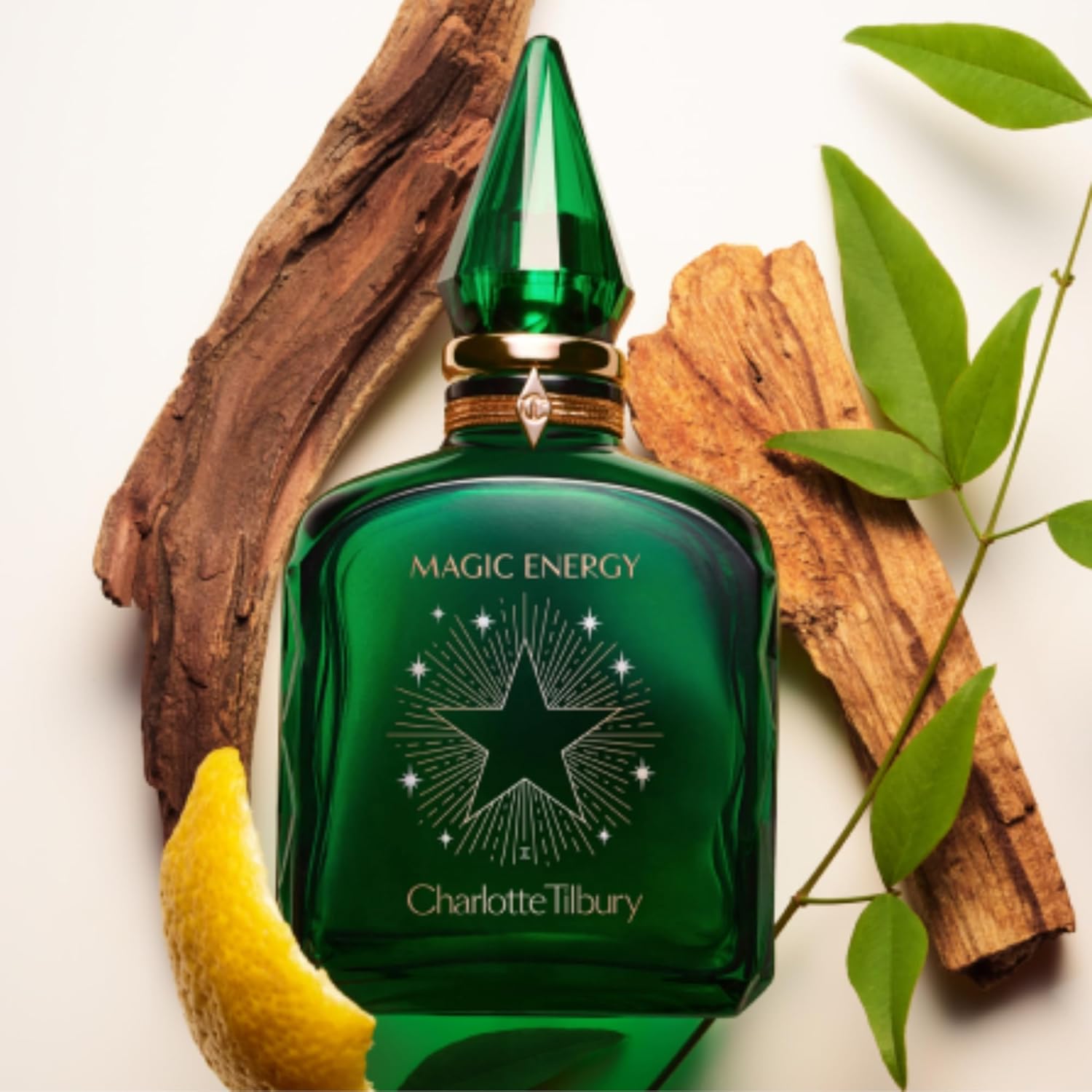 Charlotte Tilbury Magic Energy Eau De Parfum - Pheromone Enhancing Woody Perfume Enriched with Naturally-Derived Oil - Long-Lasting Scent with Notes of Bergamot, Cashmere Wood & Palo Santo - Image 5